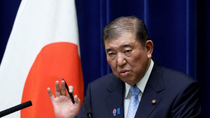 Japan PM vows to defend country's interests in face of trade tensions with US