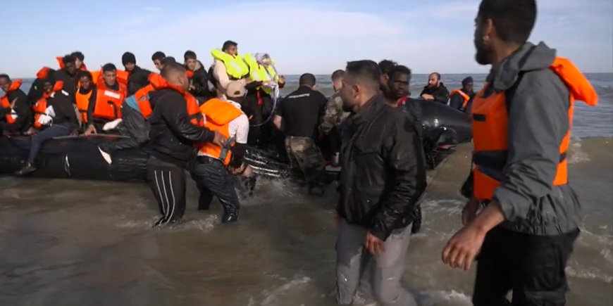 French police stop migrant boat before it leaves shore for the FIRST time